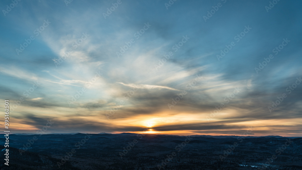 Beautiful sky at sunset in the mountains background texture