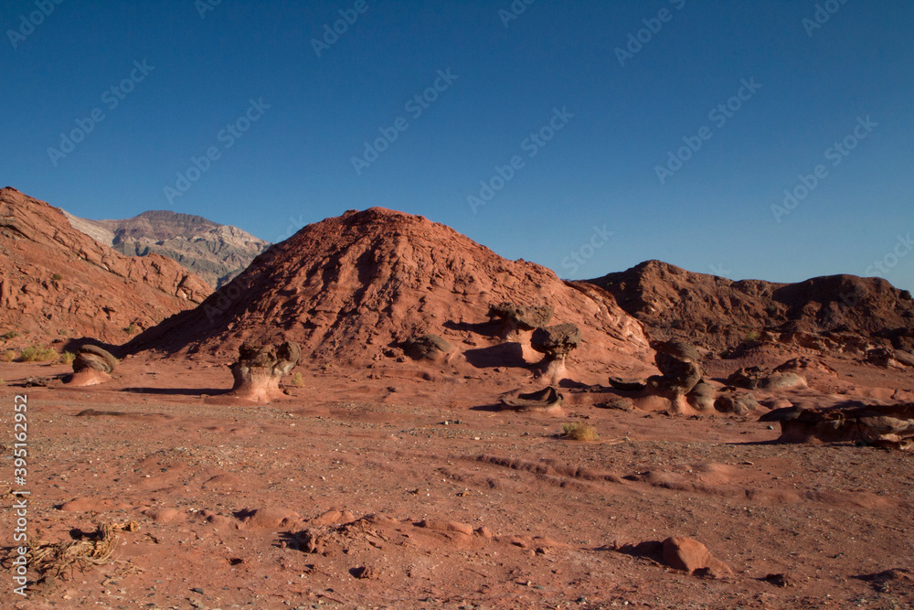 Geology. The red canyon.View of the arid desert, valley, sandstone, rocky formations and mountains in Talampaya national park in La Rioja, Argentina.