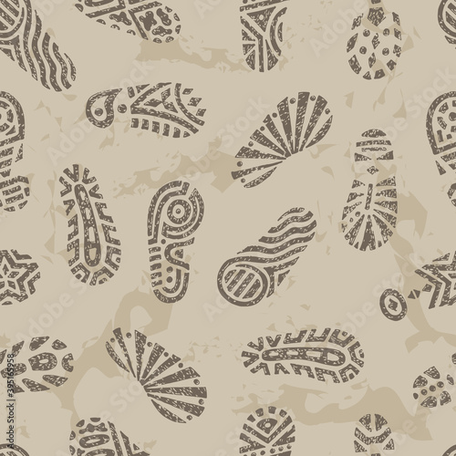 Grunge footprints Seamless pattern. Hand drawn doodles shoe tracks - Vector illustration. Gray background.