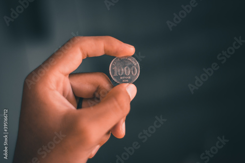 coin in hand