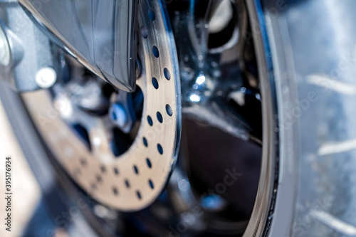 Closeup of Modern Motorcycle Front Brake Disks. photo