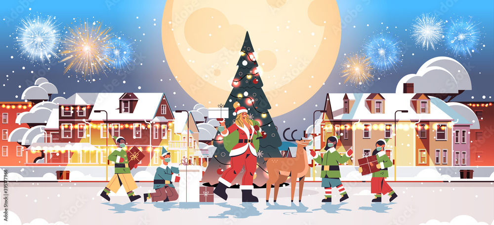 santa woman standing with deer and mix race elves in masks new year merry christmas holiday celebration greeting card fireworks in night sky cityscape background full length horizontal vector