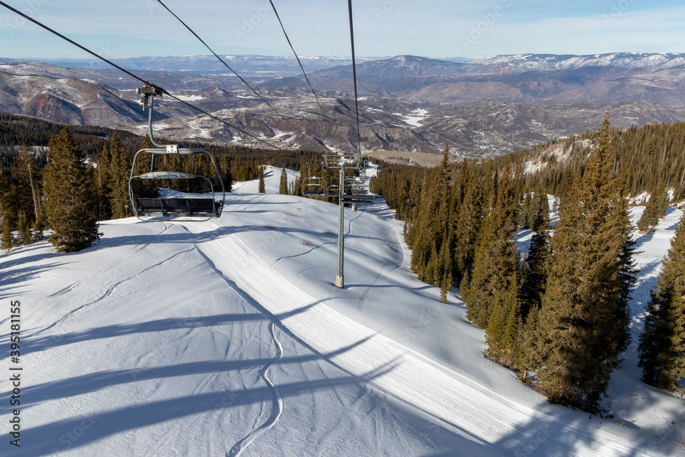 Obraz premium Winter mountain panorama with ski slopes, Colorado, Snowmass