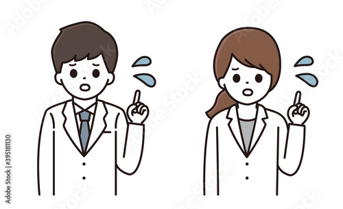 薬の説明をする薬剤師 男性 女性