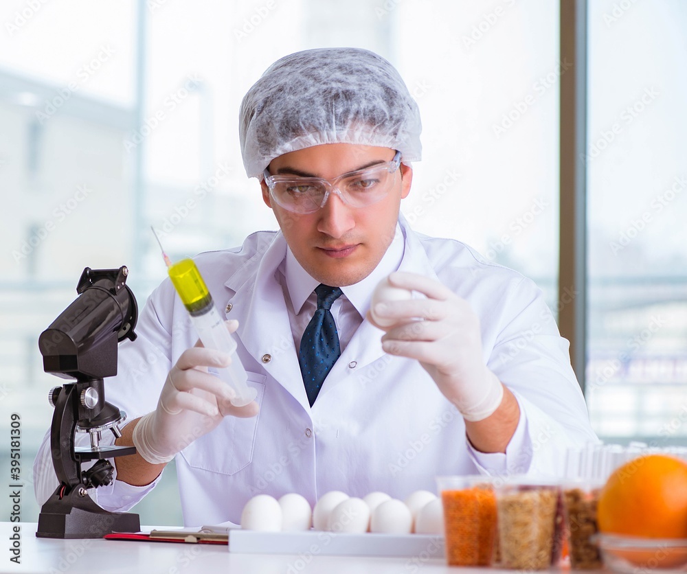 Nutrition expert testing food products in lab