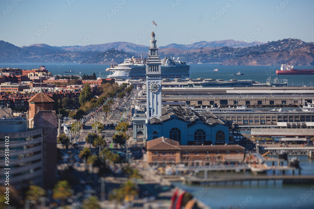 Aerial vibrant view of San Francisco port, with clock tower and the Ferry Building Marketplace, California, United States, seen from Bay Bridge