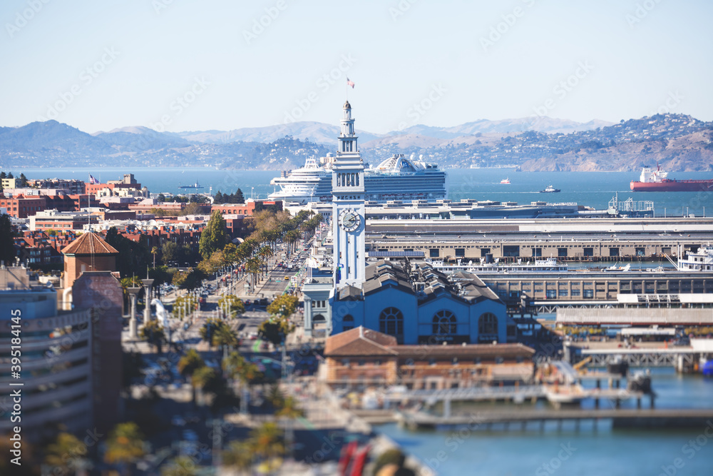Aerial vibrant view of San Francisco port, with clock tower and the Ferry Building Marketplace, California, United States, seen from Bay Bridge