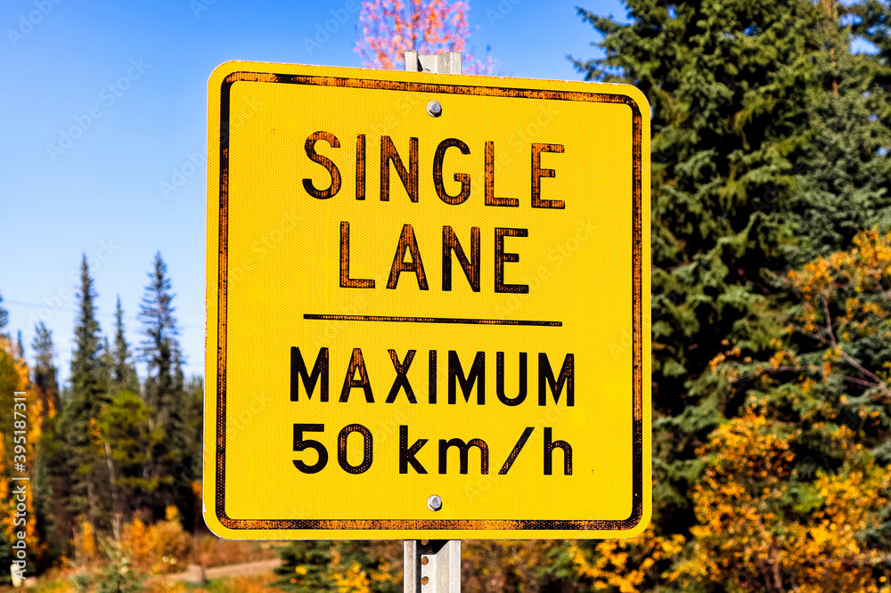 A warning Single Lane, Maxium 50 Km per hour sign
