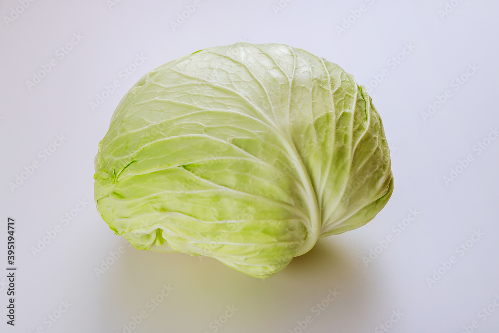 Fototapeta premium Organic green cabbage isolated on white background.