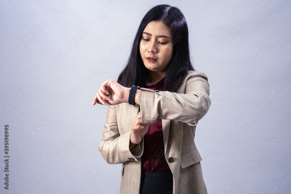 Life style portrait of a young Asian business woman in various poses, studio shot, business concept, isolated background Life style portrait of a young Asian business woman in various poses, studio shot, business concept, isolated background