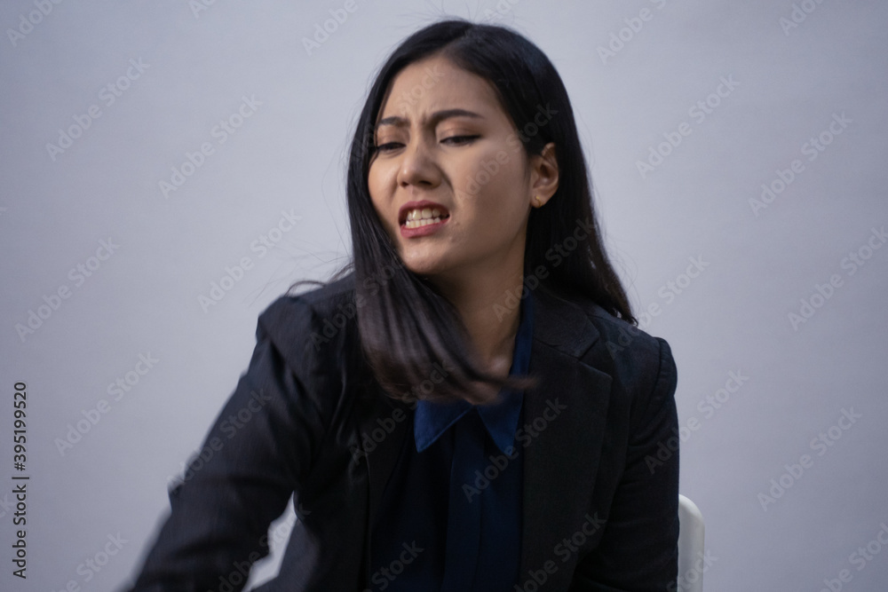 Life style portrait of a young Asian business woman in various poses, studio shot, business concept, isolated background Life style portrait of a young Asian business woman in various poses, studio shot, business concept, isolated background