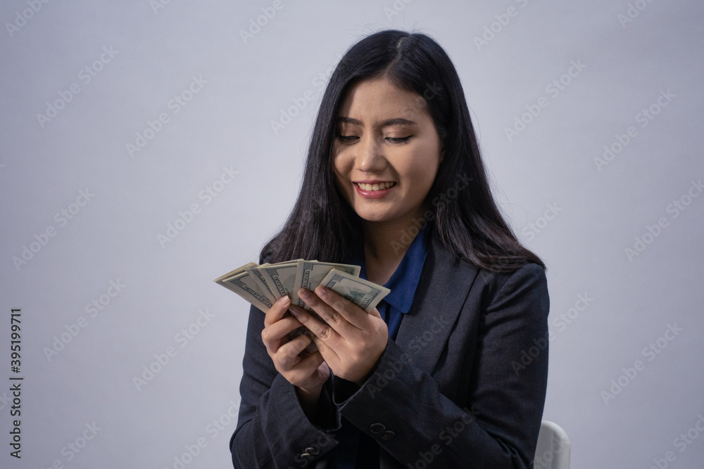 Life style portrait of a young Asian business woman in various poses, studio shot, business concept, isolated background Life style portrait of a young Asian business woman in various poses, studio shot, business concept, isolated background