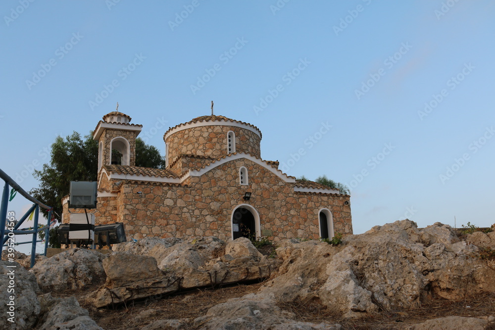 Obraz premium Republic of Cyprus. Prophet Elijah Church. Protaras. St. Elijah's Church. Tourist attraction of Protaras. holidays in Cyprus. Steps lead to the temple.