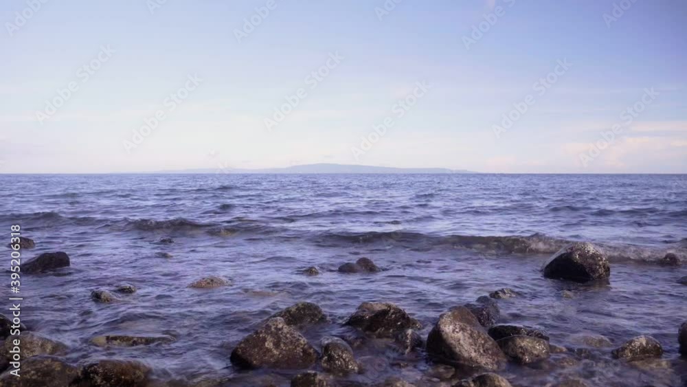 sun rays on sea water. Transparent sea background motion sun rays on sea water. Transparent sea background motion