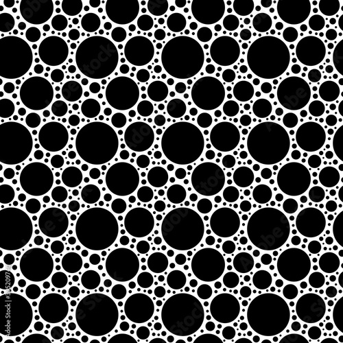 Seamless pattern. Black circles of different sizes.	