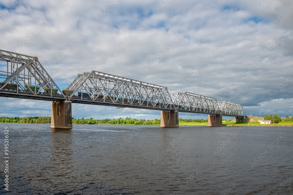 Fototapeta premium Nikolaevsky (Romanovsky) railway bridge across the Volga river in the city of Yaroslavl