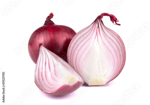 Red onion with sliceds isolated on white background.