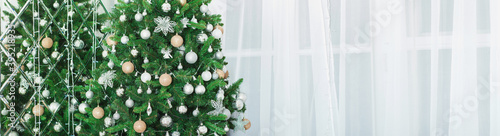 Winter Holidays banner with decorated Christmas tree. New Year template with copy space. 