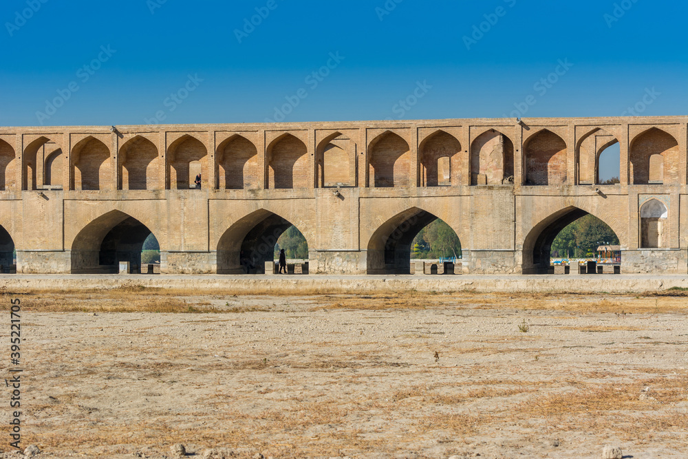 Archs of Allahverdi Khan Bridge, also named  Si-o-seh pol bridge, across the Zayanderud river, in Isfahan, Iran, a famous historic building in Persian History