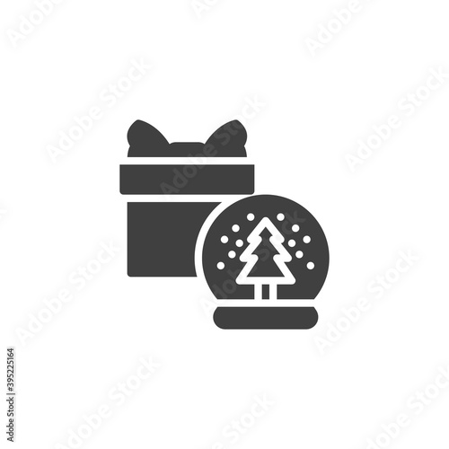 Snow globe and gift box vector icon. filled flat sign for mobile concept and web design. Christmas snow globe and gift glyph icon. Symbol, logo illustration. Vector graphics photo