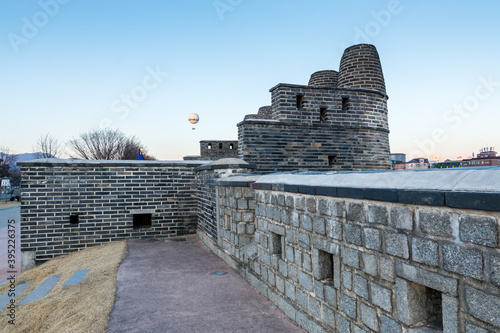 Hwaseong fortress and watch tower in Suwon city, South Korea. A famous touristic site of stone wall built in the late 18th century, UNESCO World Heritage Site.