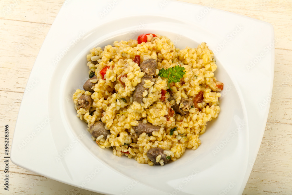 Bulgur with chicken hearts