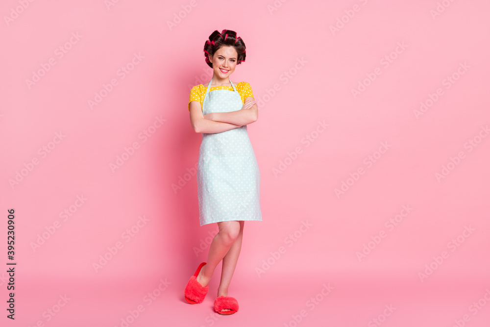 Full length body size view of her she nice-looking attractive pretty cheerful housemaid folded arms posing isolated over pink pastel color background Full length body size view of her she nice-looking attractive pretty cheerful housemaid folded arms posing isolated over pink pastel color background