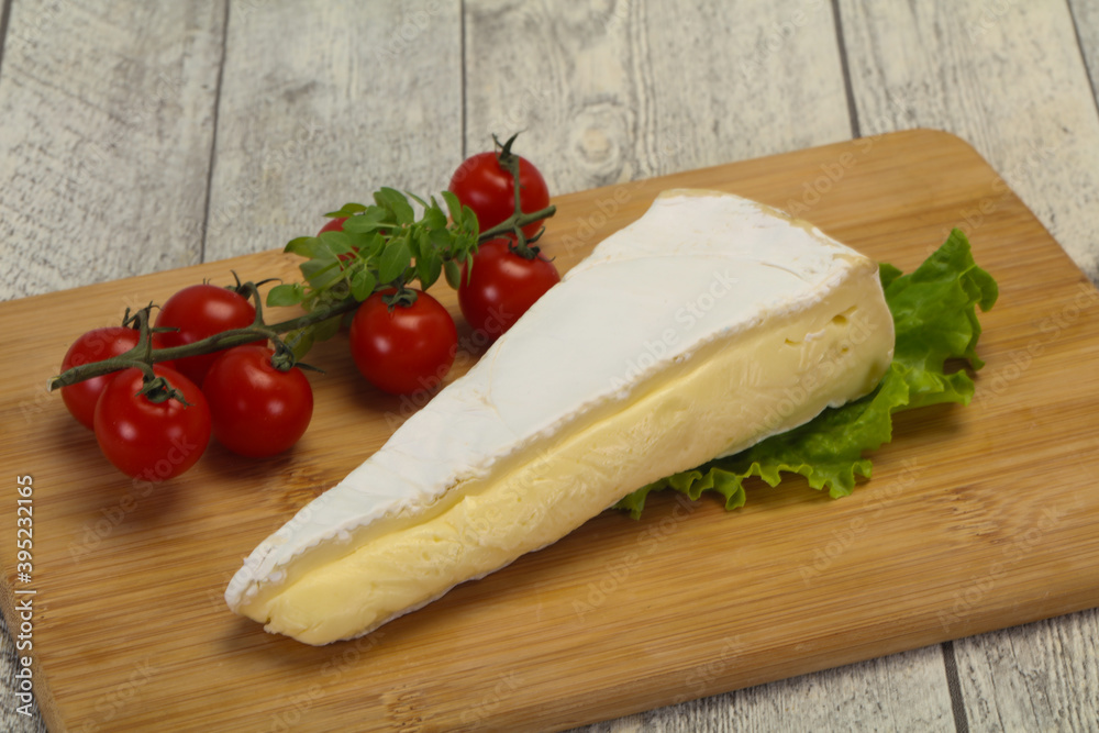 Brie cheese triangle served salad