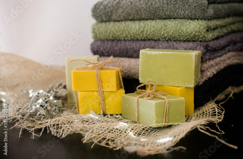 Handmade natural soap bar with towels