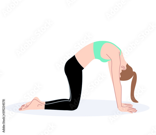 Young woman doing cat exercise for back stretching.