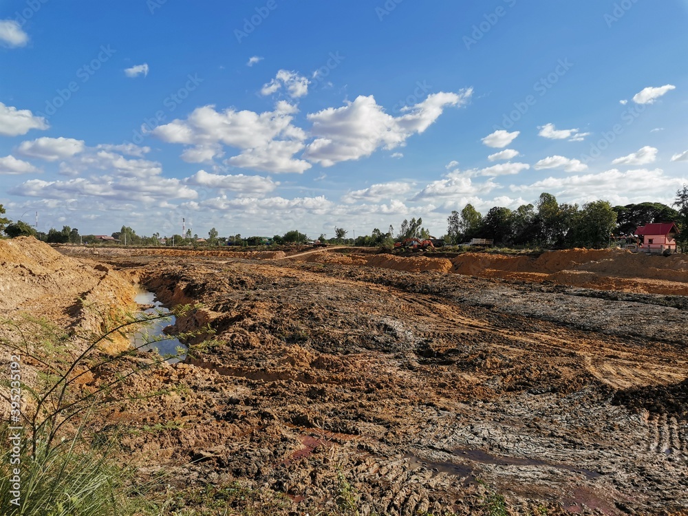 Naklejka premium Dredging a well in the dry season