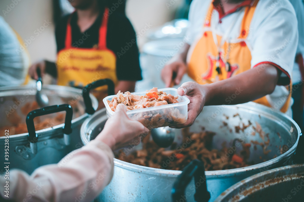 Beggar begs food from donors: The Concept of Hunger Hunger: : The concept of feeding