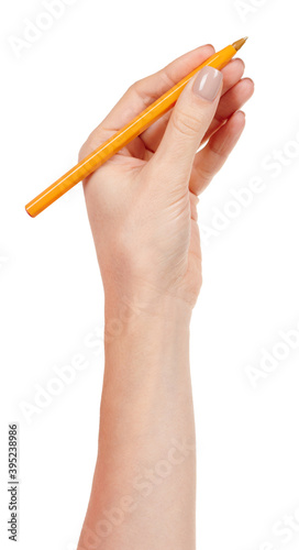 Hand with yellow writing pen isolated on white background.