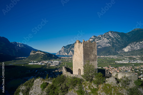 Flying on drone, aerial view of Arco Castle ruins, Lake Garda. Italy. Arco Medieval Castle on the top of the rock. © Berg