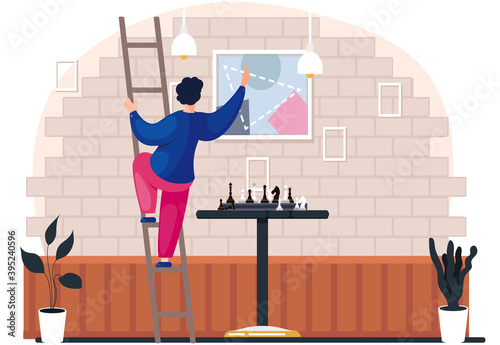 Cartoon young man going up the stairs hangs a picture on a brick wall in the room with chess on the table. Character is doing household chores. player in the living room near the chessboard