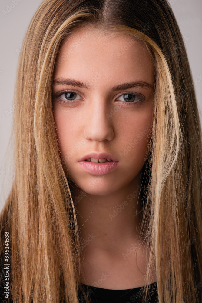 portrait of a beautiful blonde teen girl