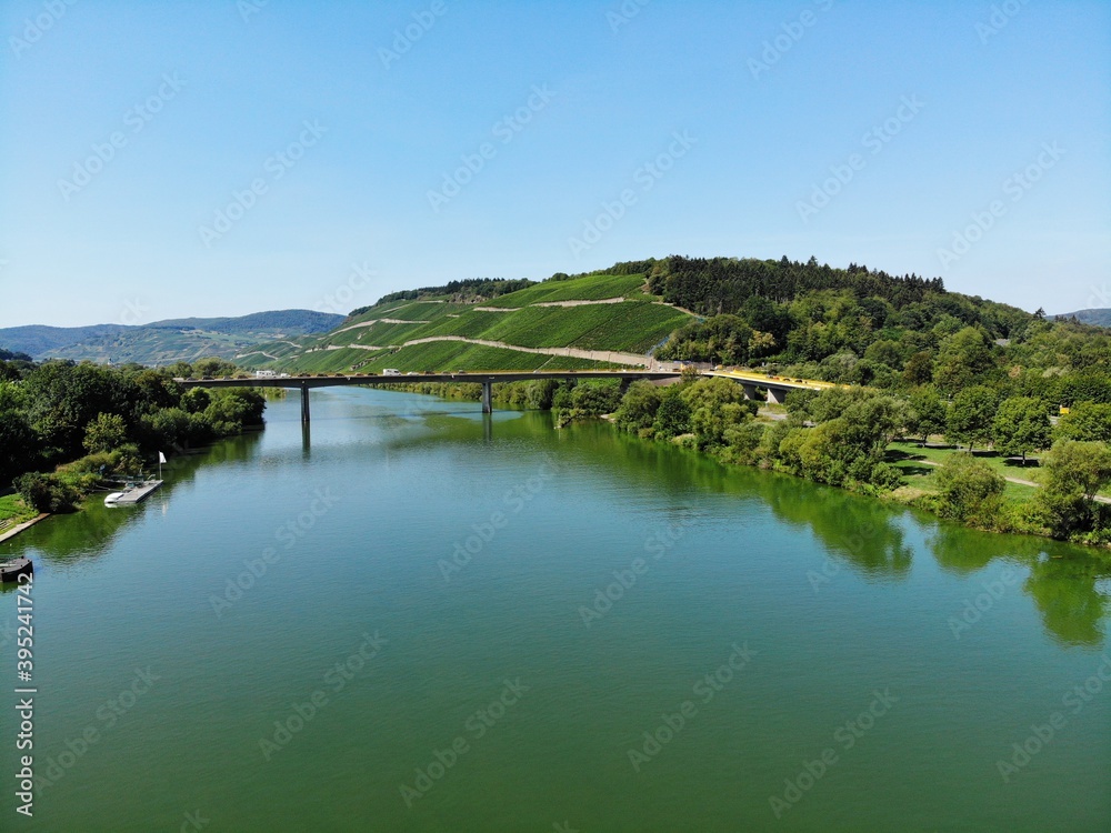The beautiful River Moselle, Mosel in Germany during summer. The Area where the good Wine comes from with all the grapeyards.