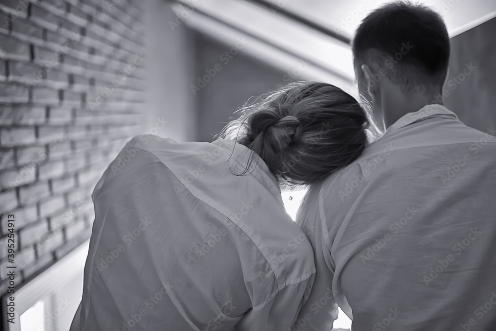 couple in love at home view from the back, man and woman relationship concept couple in love at home view from the back, man and woman relationship concept