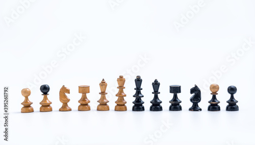 Old Chess Set - Full Set of 12 pieces on a white background with copy space
