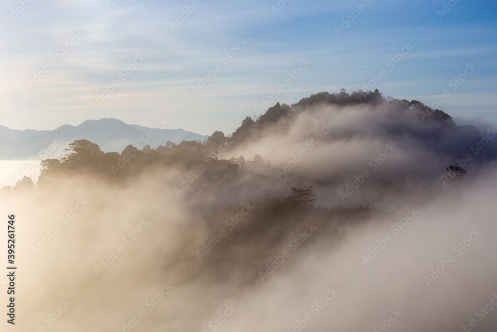 Beautiful nature in the morning mist on the high mountain peaks of southern Thailand at Khao Khai Nui.