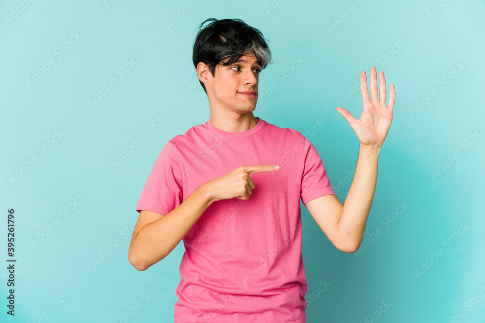 Young caucasian skinny man expressing emotions isolated on blue background Young caucasian skinny man expressing emotions isolated on blue background
