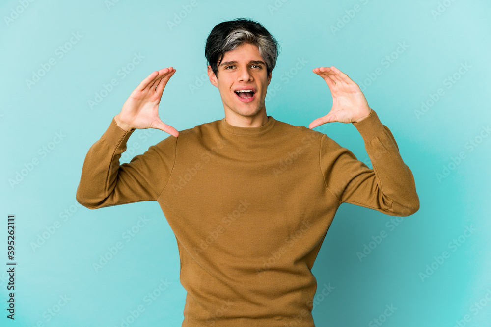 Young caucasian skinny man expressing emotions isolated on blue background Young caucasian skinny man expressing emotions isolated on blue background