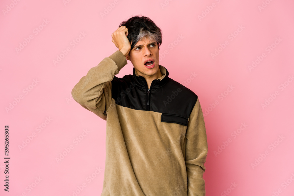 Young skinny hispanic man being shocked, she has remembered important meeting.