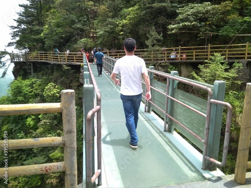 couple walking on bridge