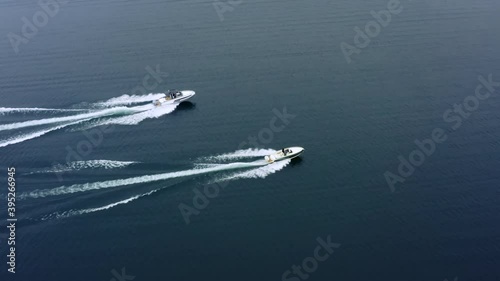 Wallpaper Mural Flying Away Shot of Speed Boats Sailing On Lake Along Each Other. Torontodigital.ca