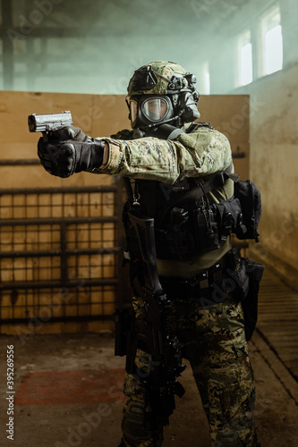 Croatian soldier in Cropat woodland uniform wearing gas mask M95.