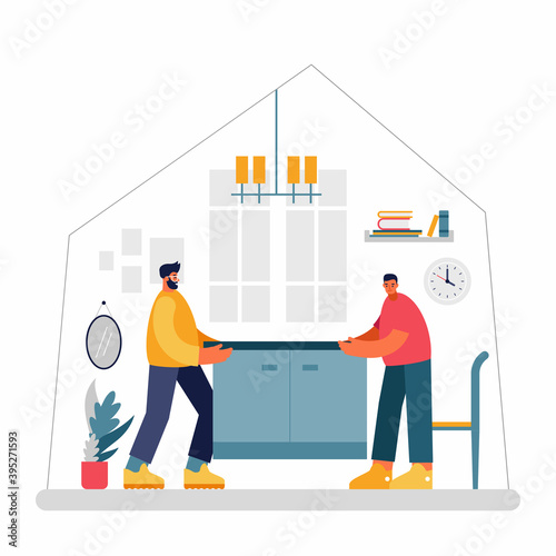 Men moving heavy cupboard together during relocation