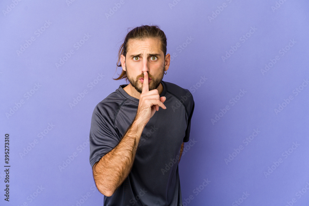 Young man with long hair look surprised pointing with finger, smiling broadly. Young man with long hair look surprised pointing with finger, smiling broadly.