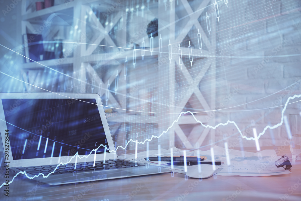 Stock market graph and table with computer background. Double exposure. Concept of financial analysis. Stock market graph and table with computer background. Double exposure. Concept of financial analysis.
