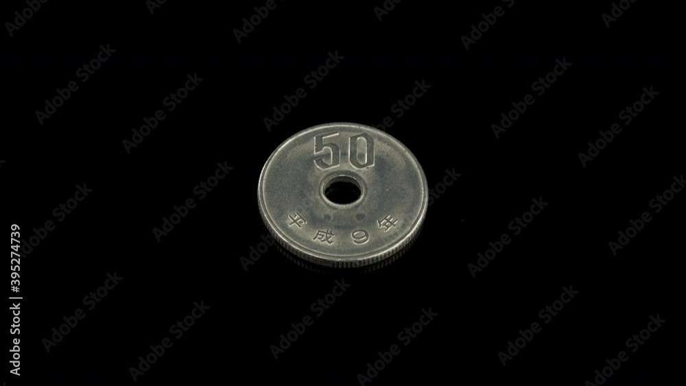 Japan 50 Yen coin macro isolated shot, coined in Heisei 9 or 1997 Japan 50 Yen coin macro isolated shot, coined in Heisei 9 or 1997